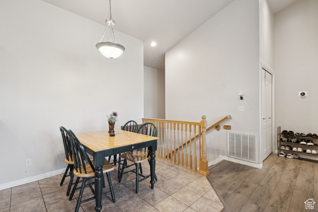 Dining space with baseboards and recessed lighting