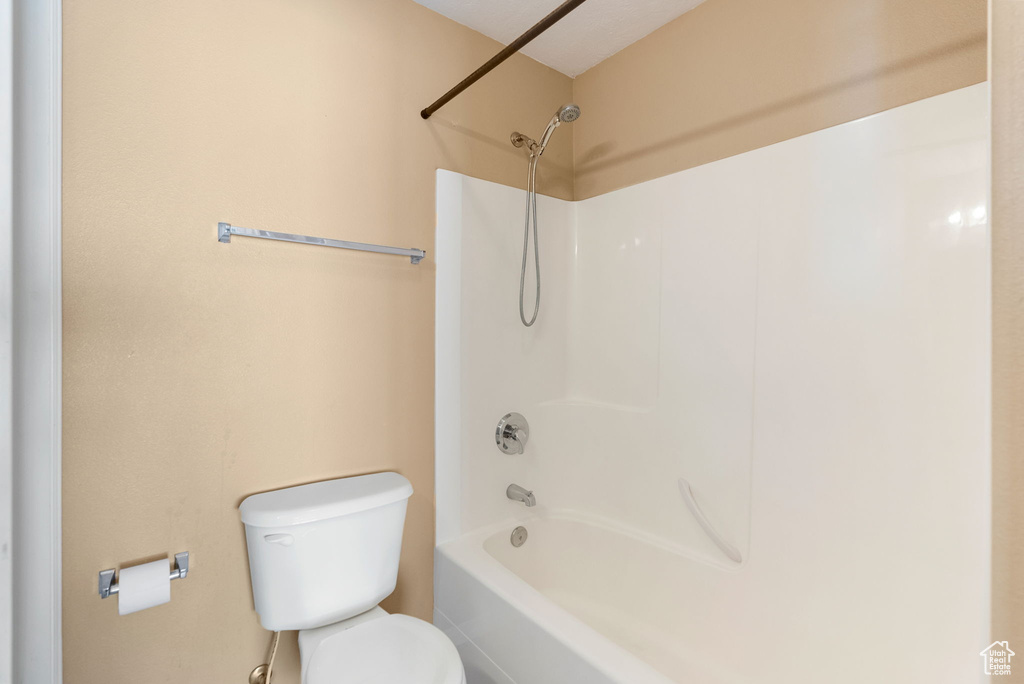 Full bath with toilet and  shower combination