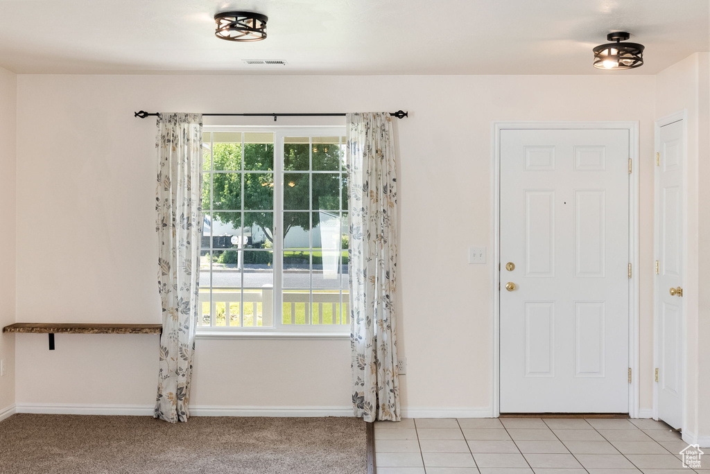Entryway featuring baseboards