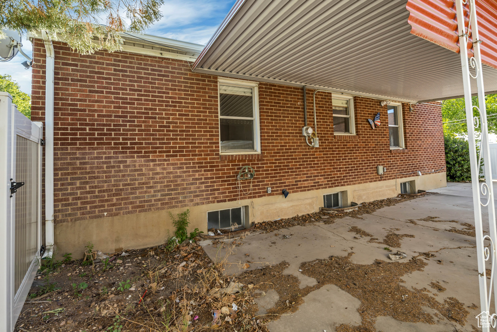 View of home\\\'s exterior with brick siding