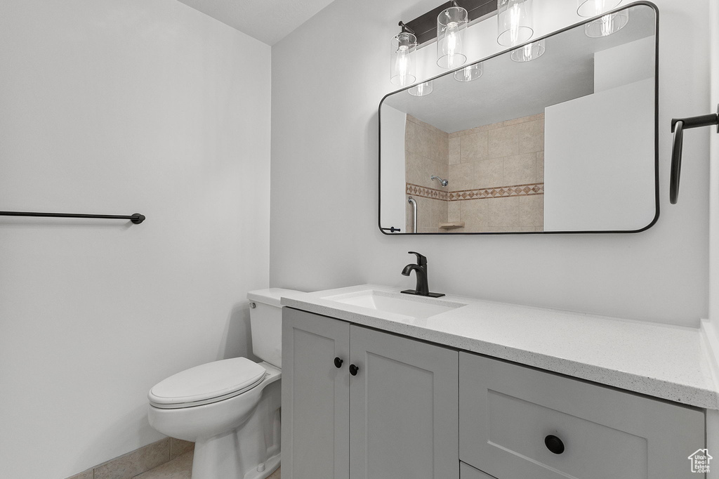 Full bathroom with vanity and a shower