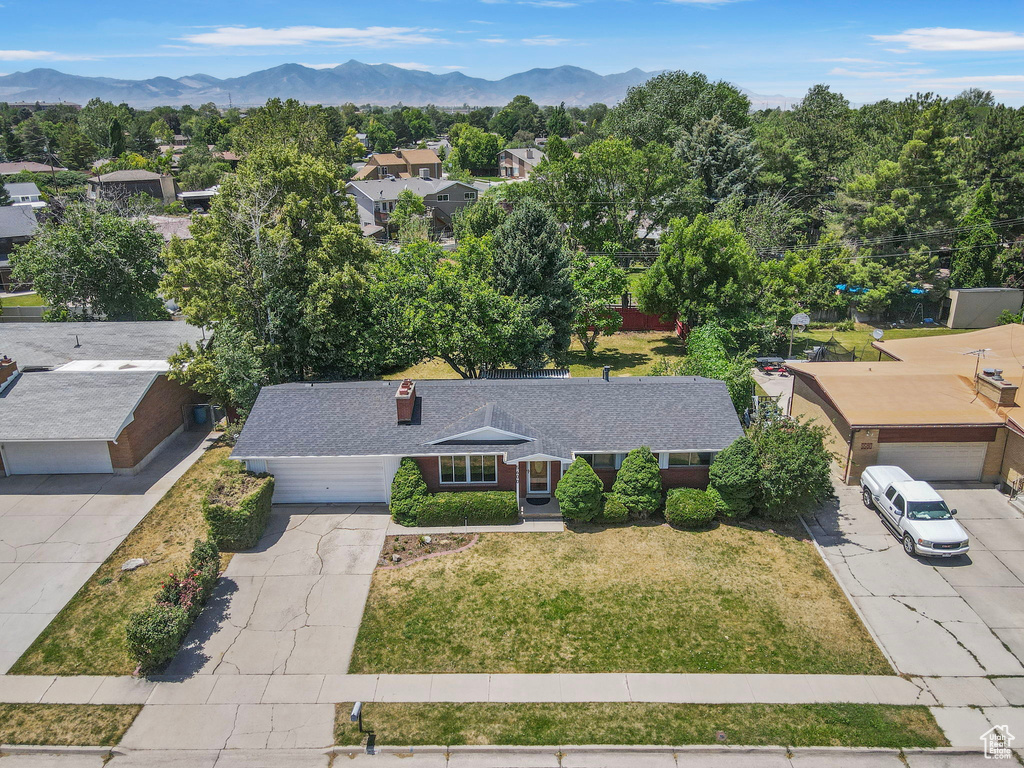 Aerial perspective of suburban area featuring mountains