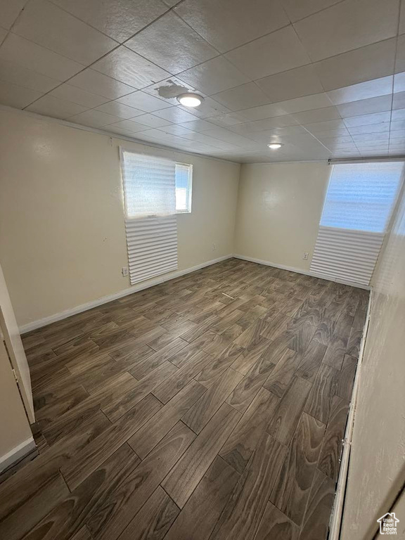 Spare room featuring wood finished floors