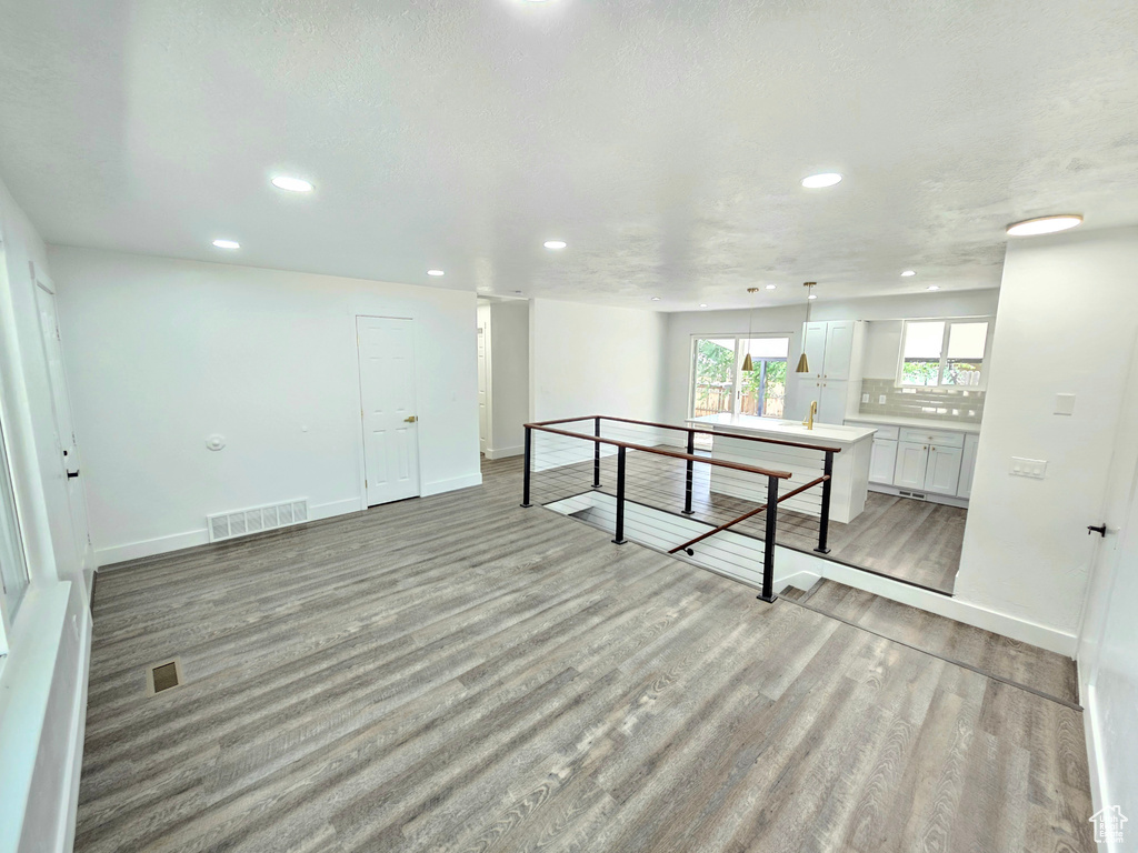 Spare room with recessed lighting and light wood-style flooring