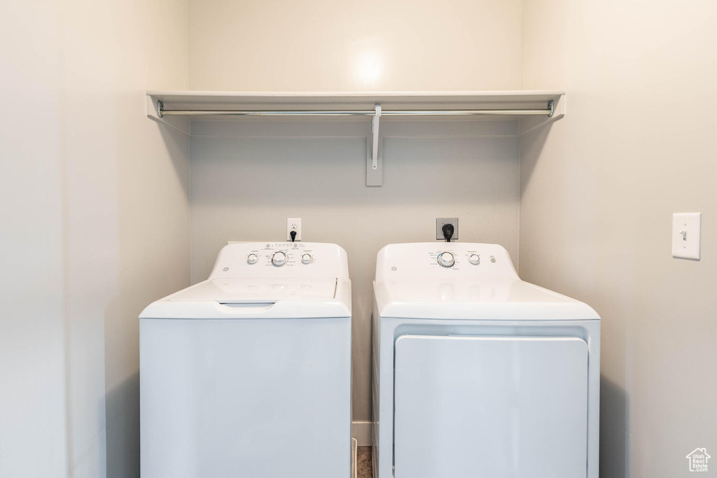 Laundry area with washing machine and clothes dryer