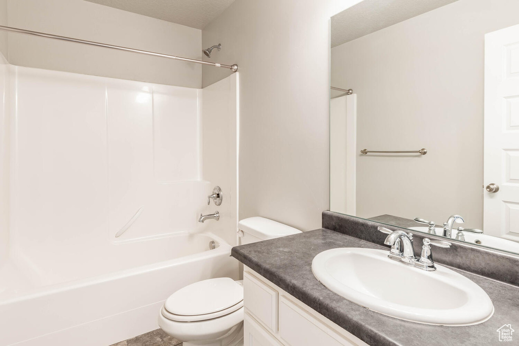 Full bathroom with vanity and shower / washtub combination