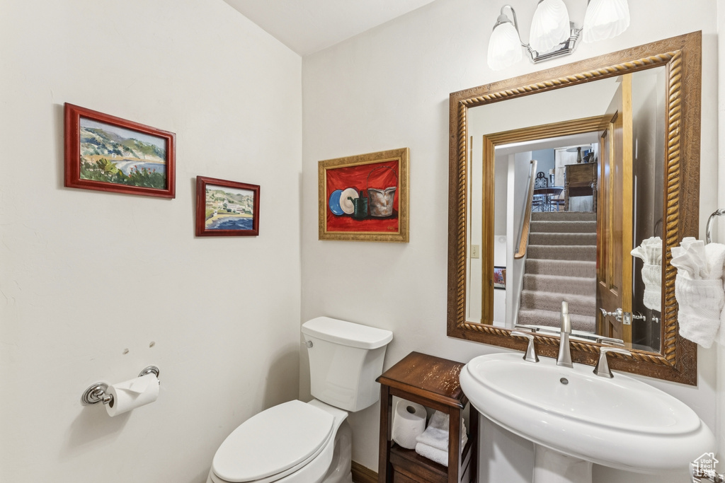 Bathroom with toilet and a sink