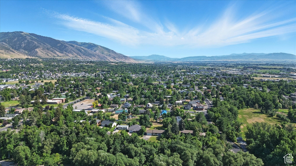 Aerial overview of property's location with mountains