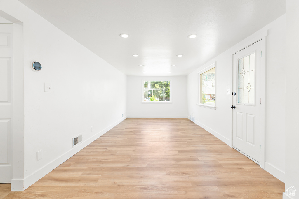 Entrance foyer featuring recessed lighting and light wood finished floors