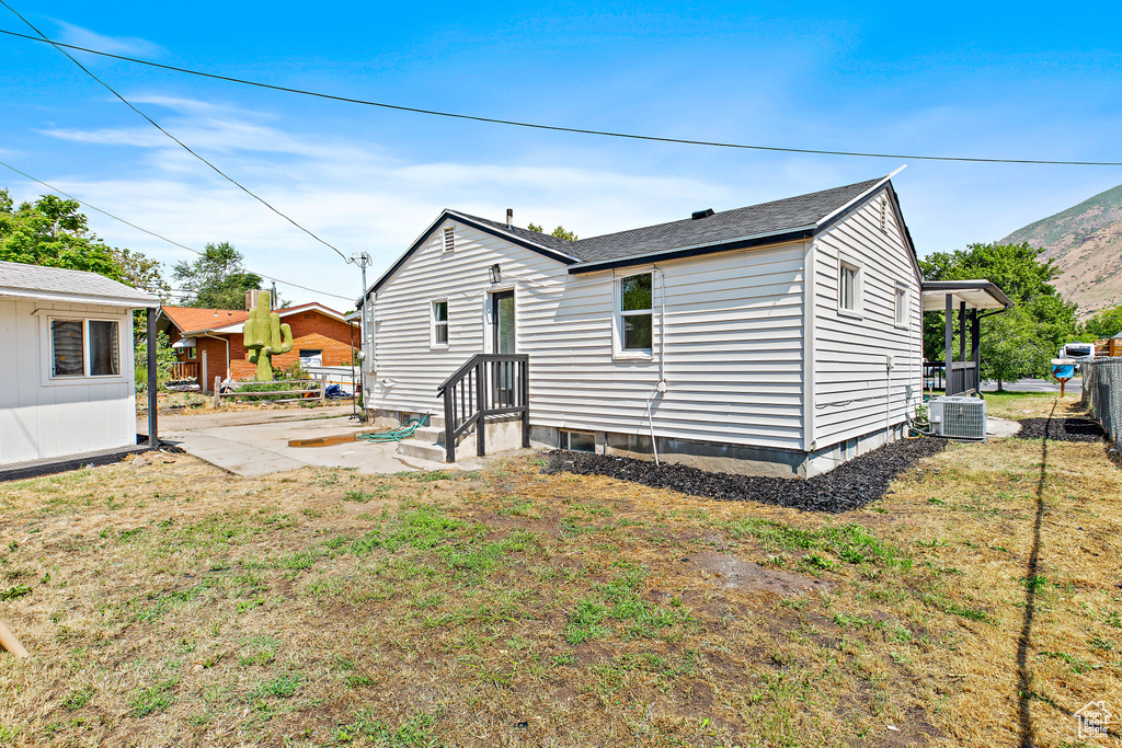 Back of property with a patio area