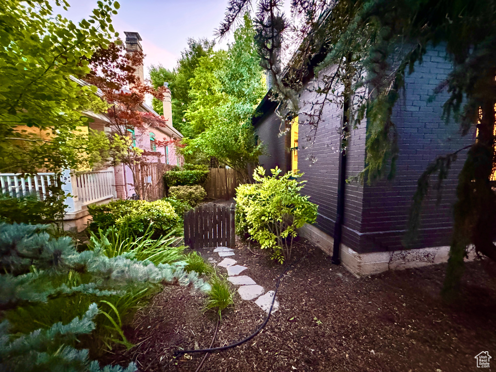 View of yard at dusk