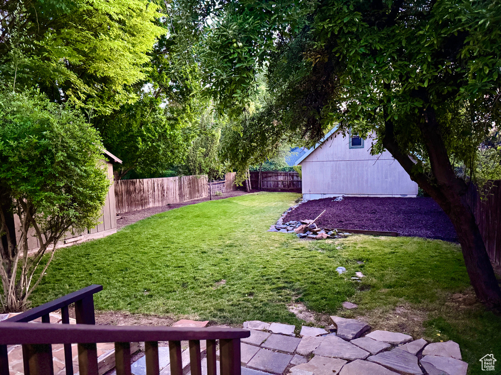 View of fenced backyard