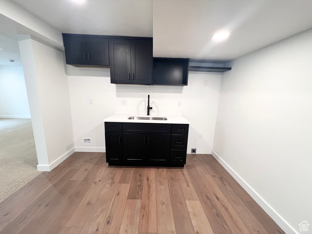 Bar with light wood finished floors