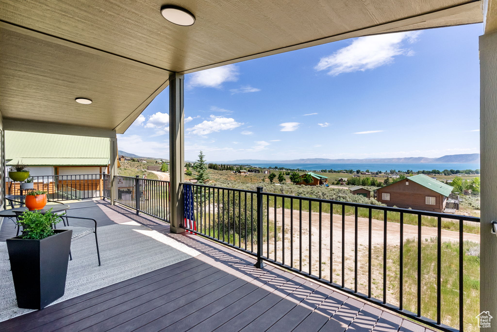 Wooden deck featuring a mountain view