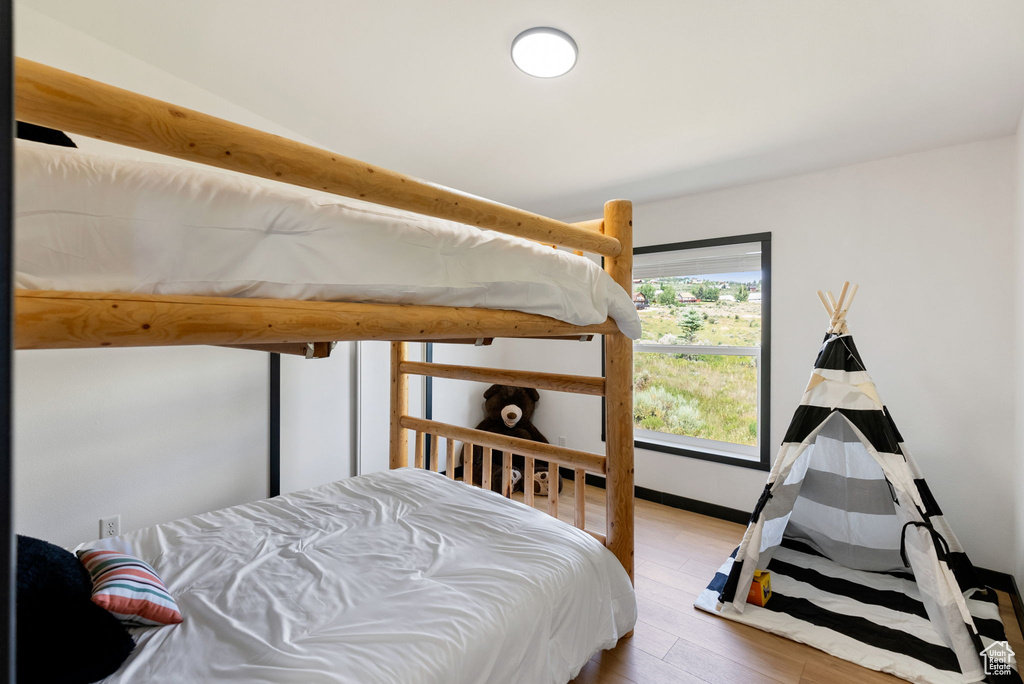 Bedroom featuring wood finished floors