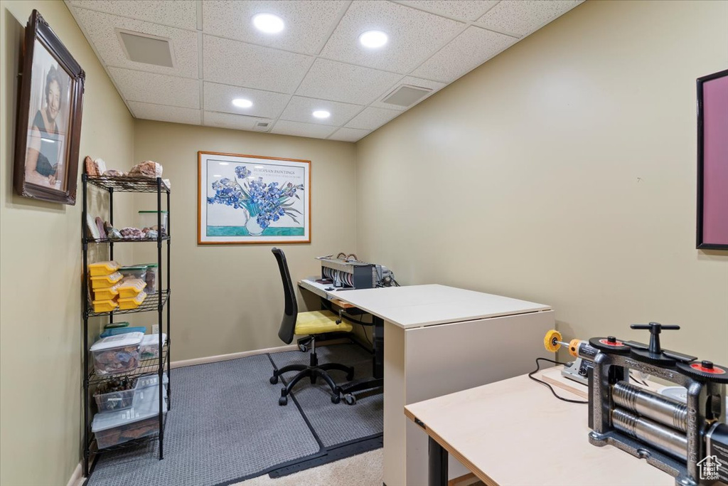 Carpeted office space featuring recessed lighting and a paneled ceiling