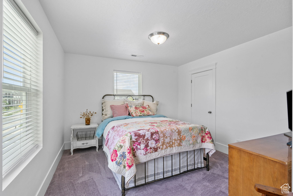 Bedroom featuring carpet flooring