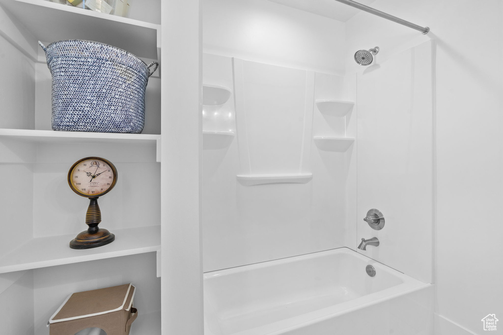 Full bathroom with shower / tub combination