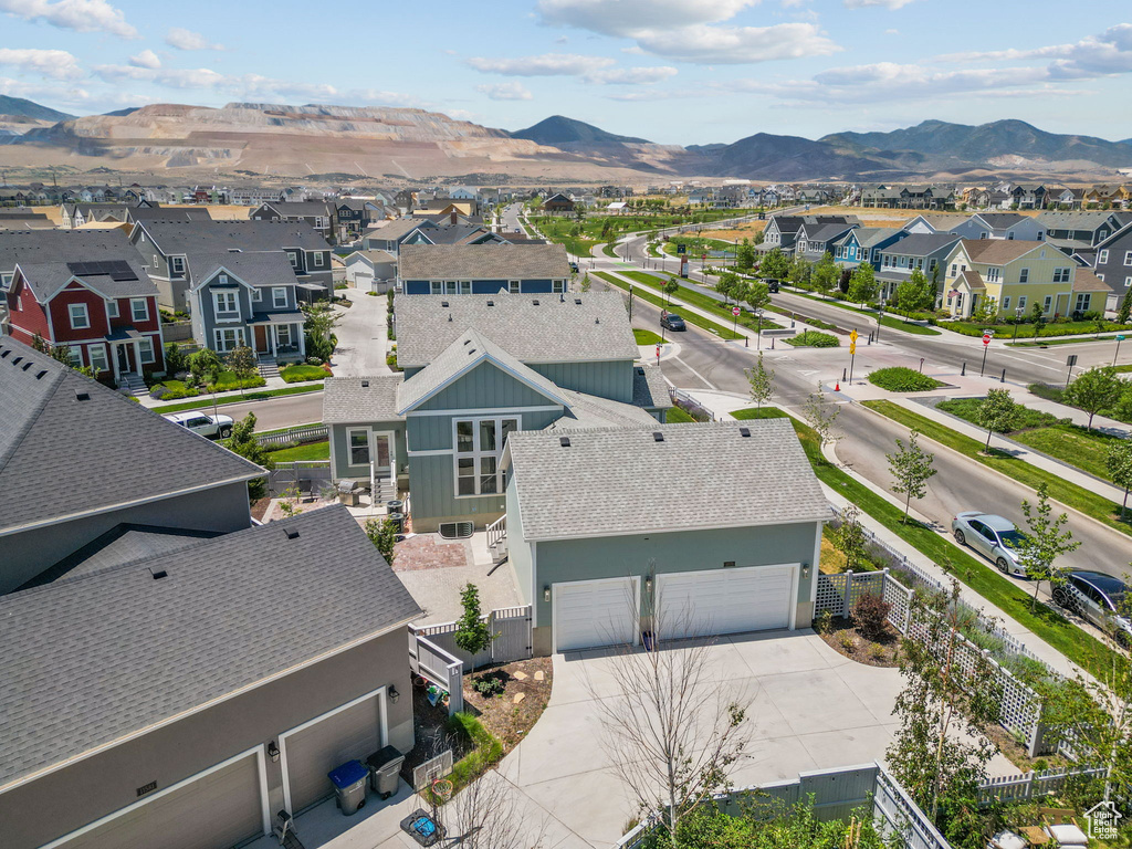 Aerial view of residential area with a mountainous background