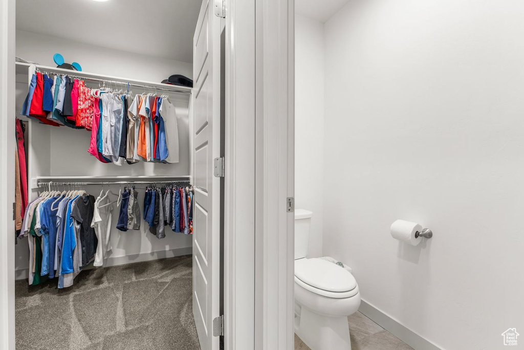 Bathroom with a walk in closet