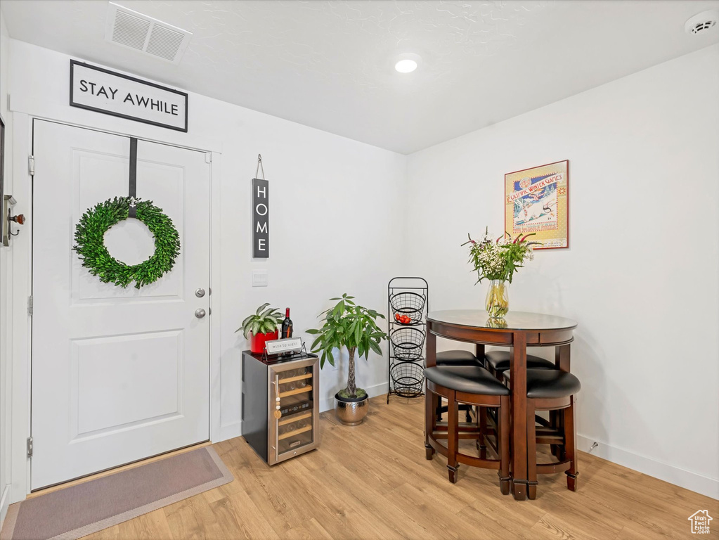 Dining room featuring light wood-style floors and recessed lighting