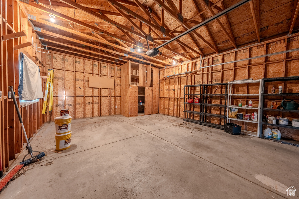 Misc room featuring a garage and concrete floors