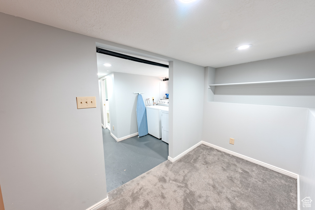 Finished basement with washer and dryer, carpet flooring, and recessed lighting