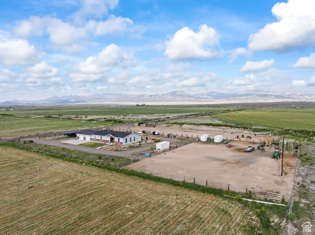 Aerial view of sparsely populated area featuring a mountain backdrop