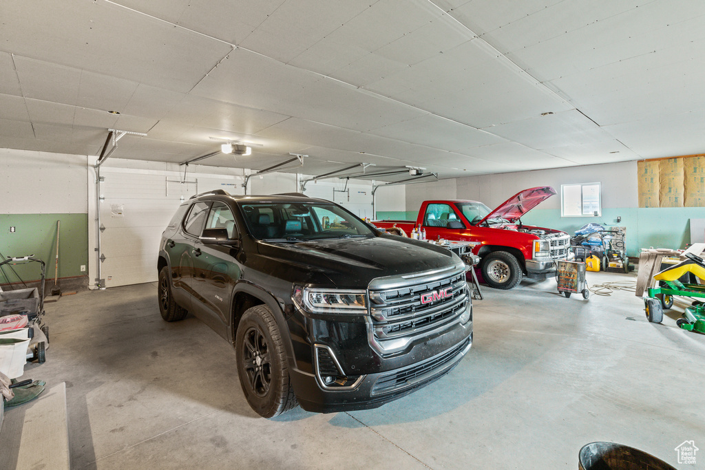 Garage featuring a garage door opener