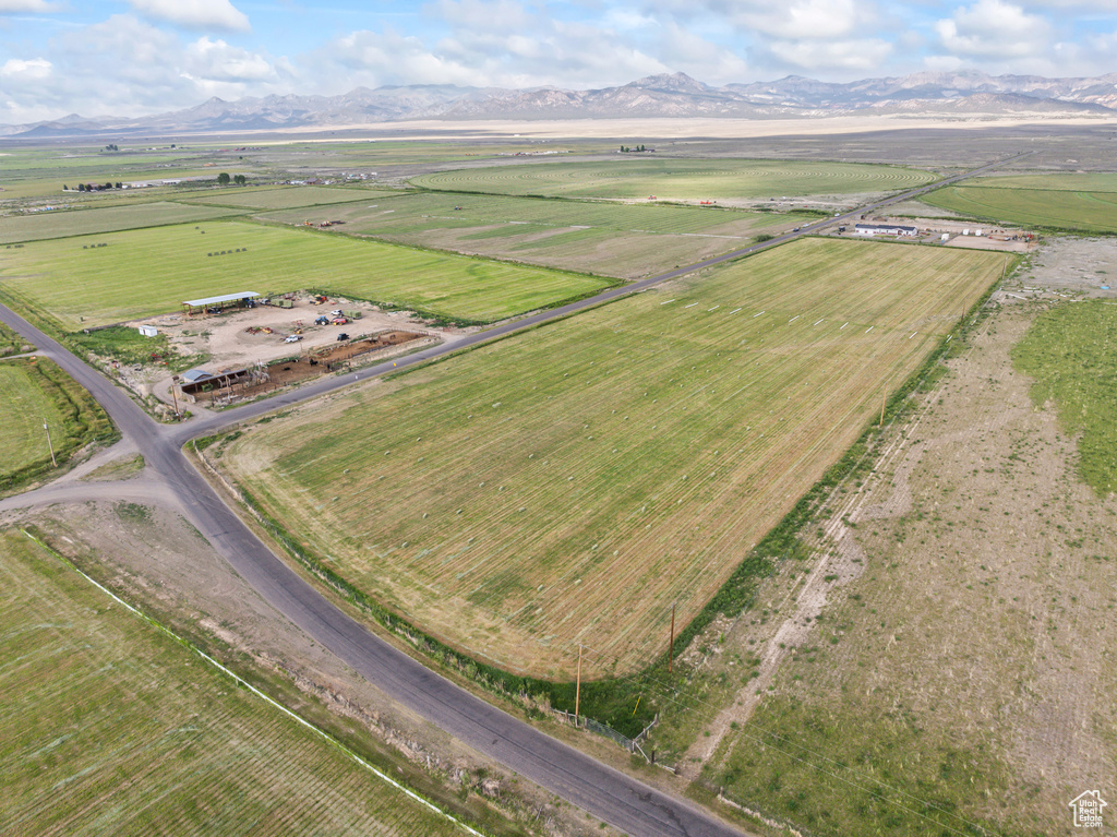 Aerial view of sparsely populated area featuring a mountain backdrop