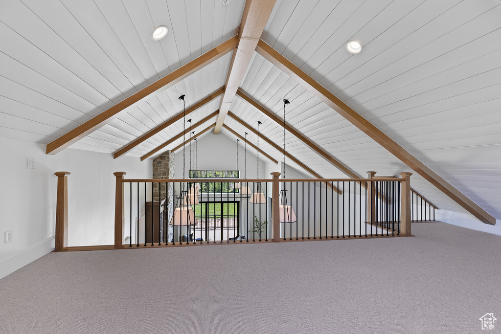 Additional living space featuring recessed lighting, carpet, and wood ceiling