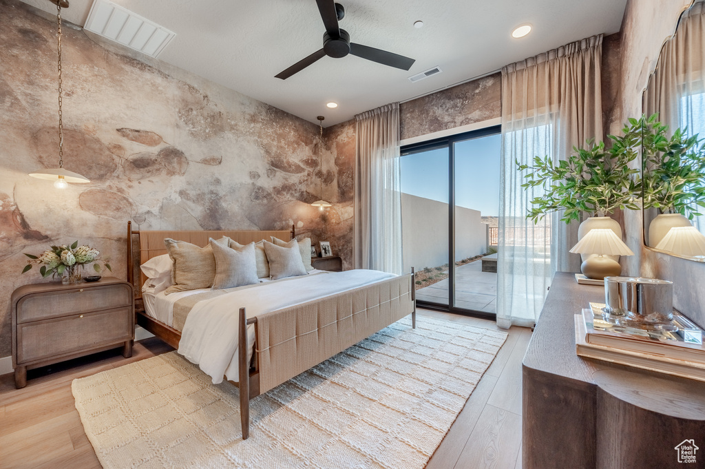 Bedroom featuring access to outside, wood finished floors, ceiling fan, and recessed lighting