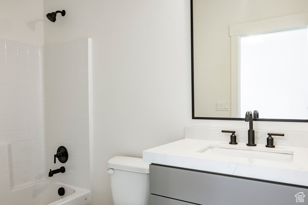 Full bathroom with vanity and tub / shower combination