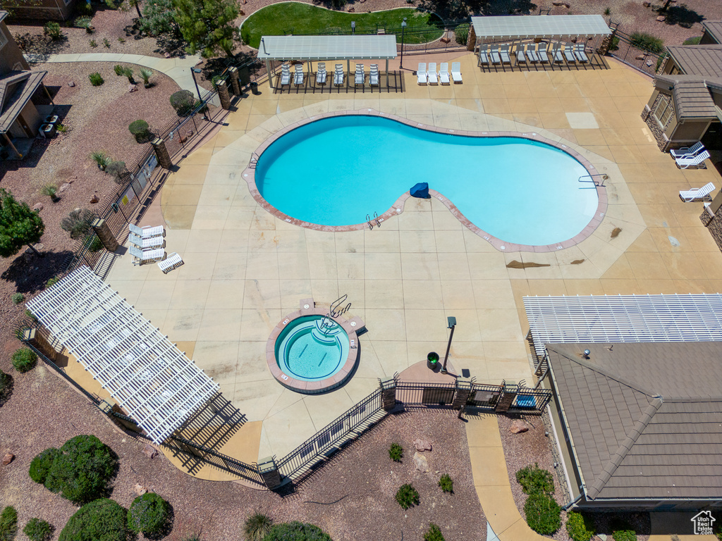 Community pool featuring a patio area