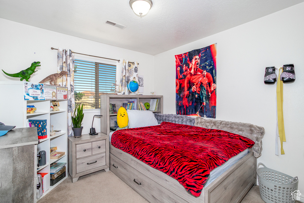 Bedroom with carpet