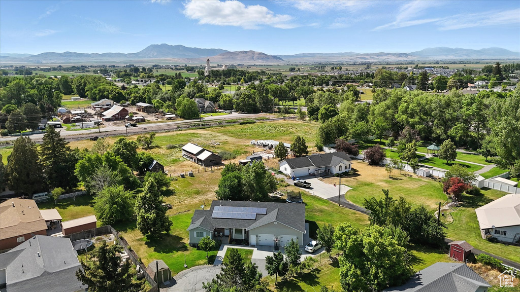 Aerial view of residential area with a mountainous background