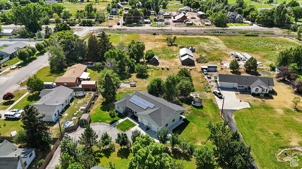 Aerial overview of property's location with nearby suburban area