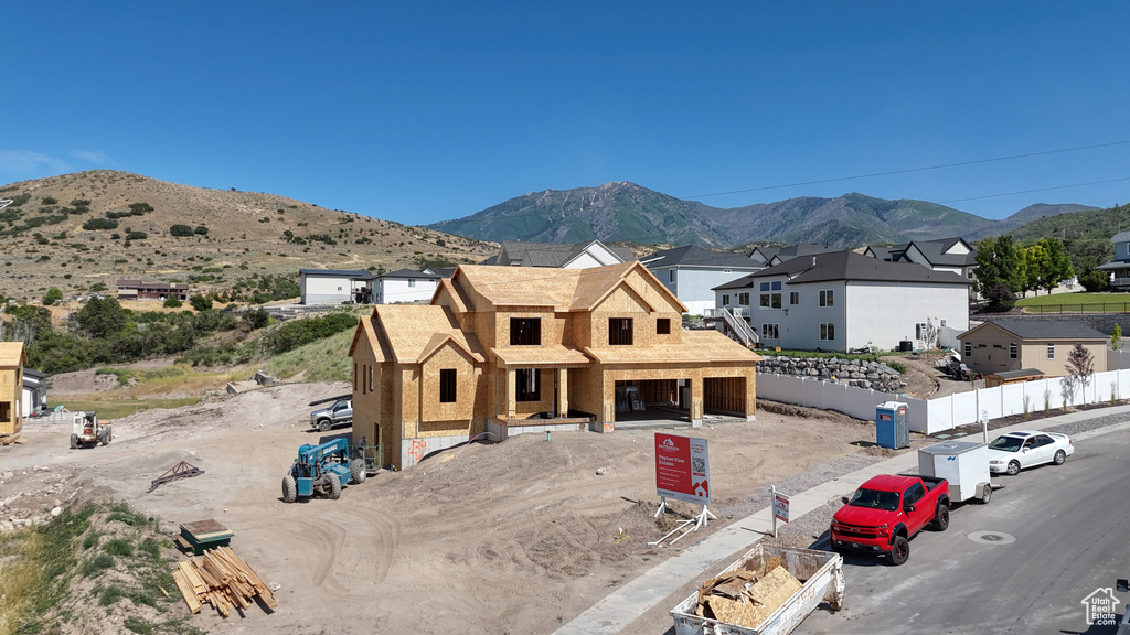 View of mountain background featuring nearby suburban area