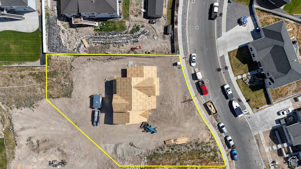 Aerial perspective of suburban area with property parcel outlined