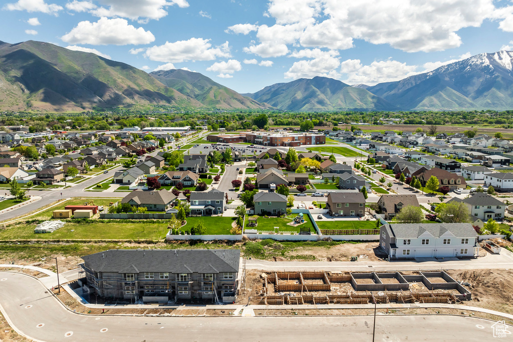Aerial view of residential area featuring mountains