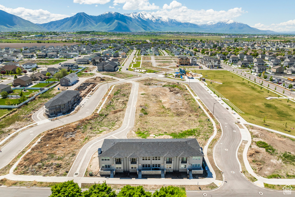 Aerial perspective of suburban area featuring mountains
