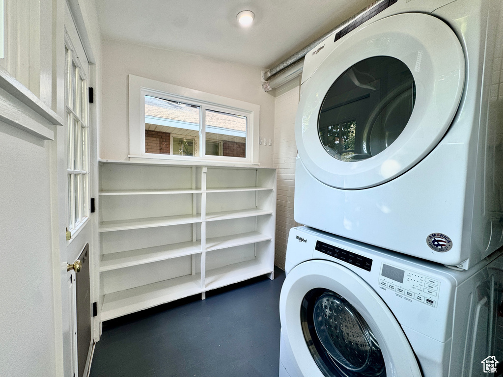 Washroom featuring estacked washer and dryer