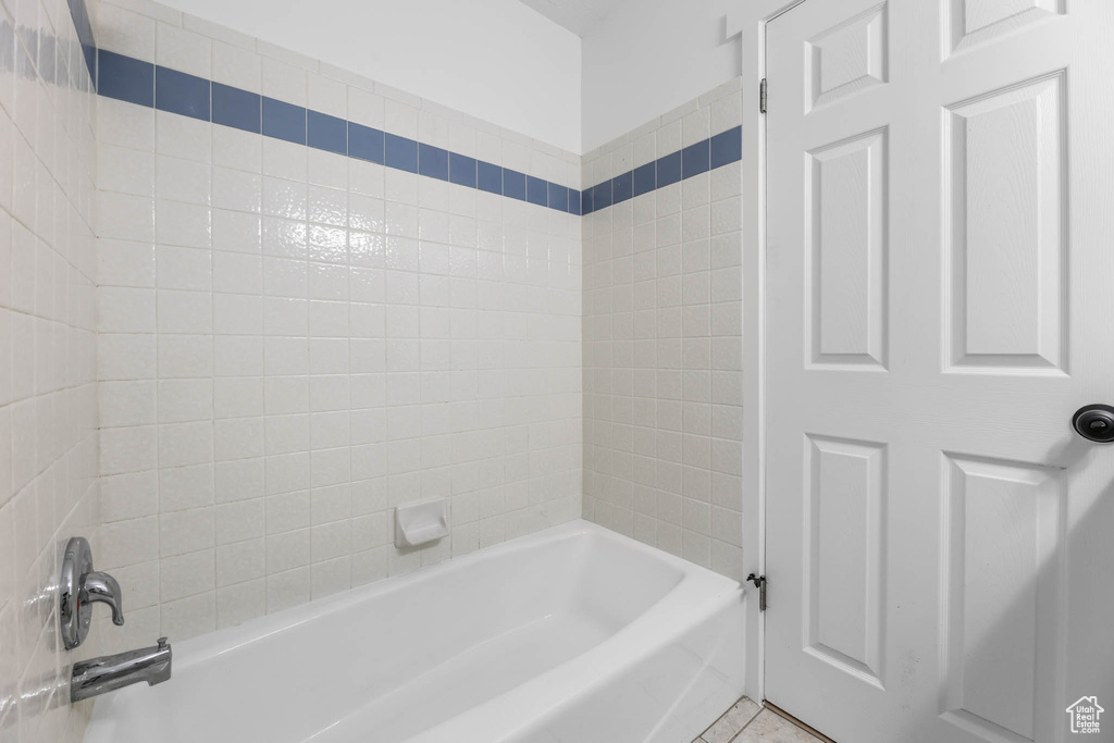 Bathroom featuring bathing tub / shower combination