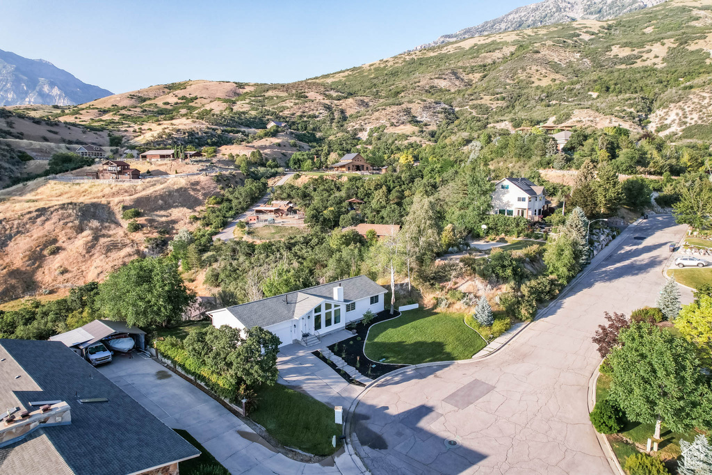 Aerial view of residential area with a mountain backdrop