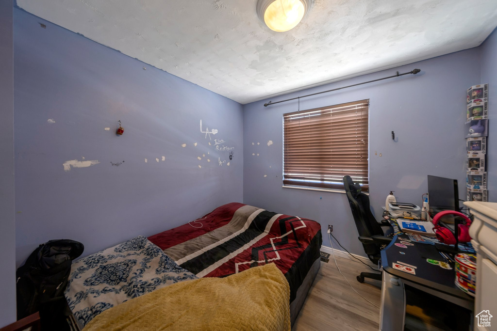 Bedroom with baseboards