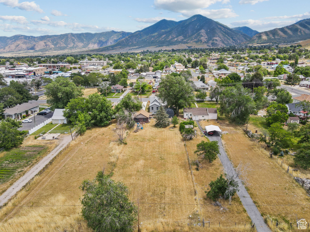 Aerial view of residential area featuring mountains