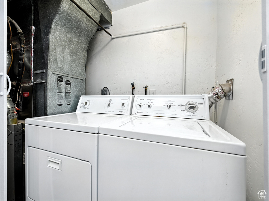 Laundry area featuring independent washer and dryer
