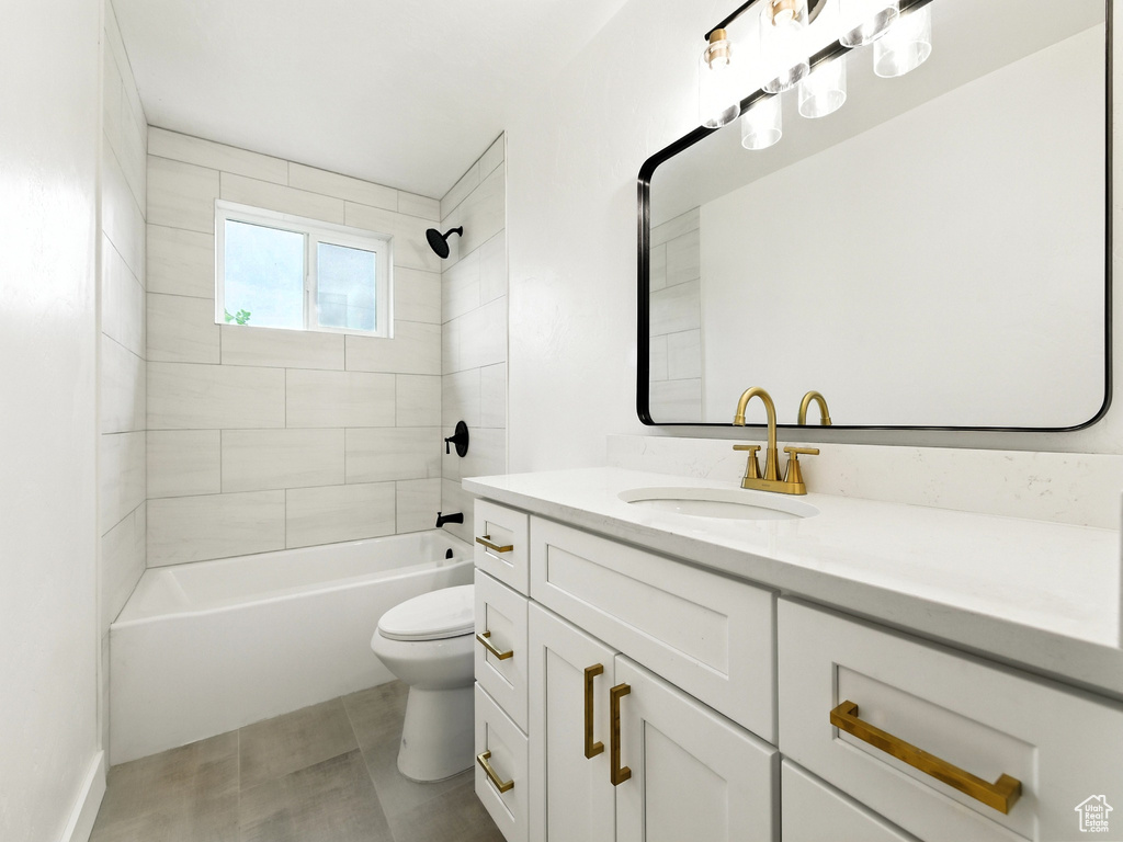 Bathroom featuring vanity and tub / shower combination