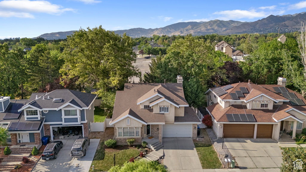 Aerial perspective of suburban area featuring mountains
