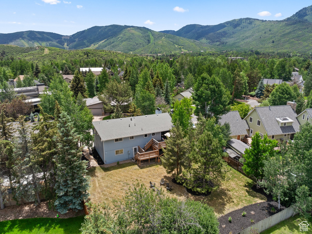 Aerial view of residential area with a mountain backdrop